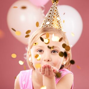 balloons-birthday-portrait-girl-with-confetti-pink-background-party-celebration-special-day-happy-excited-young-child-with-decoration-magic-wonder-glitter-studio